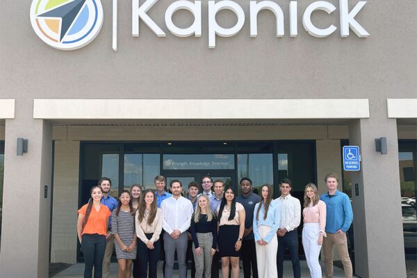 Emerging Professionals - Intern Group Photo in Front of Kapnick Office