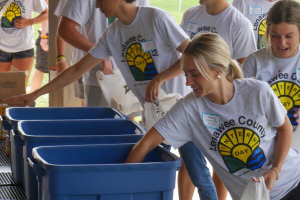 Emerging Professionals - Team Volunteering Filling Meal Kits